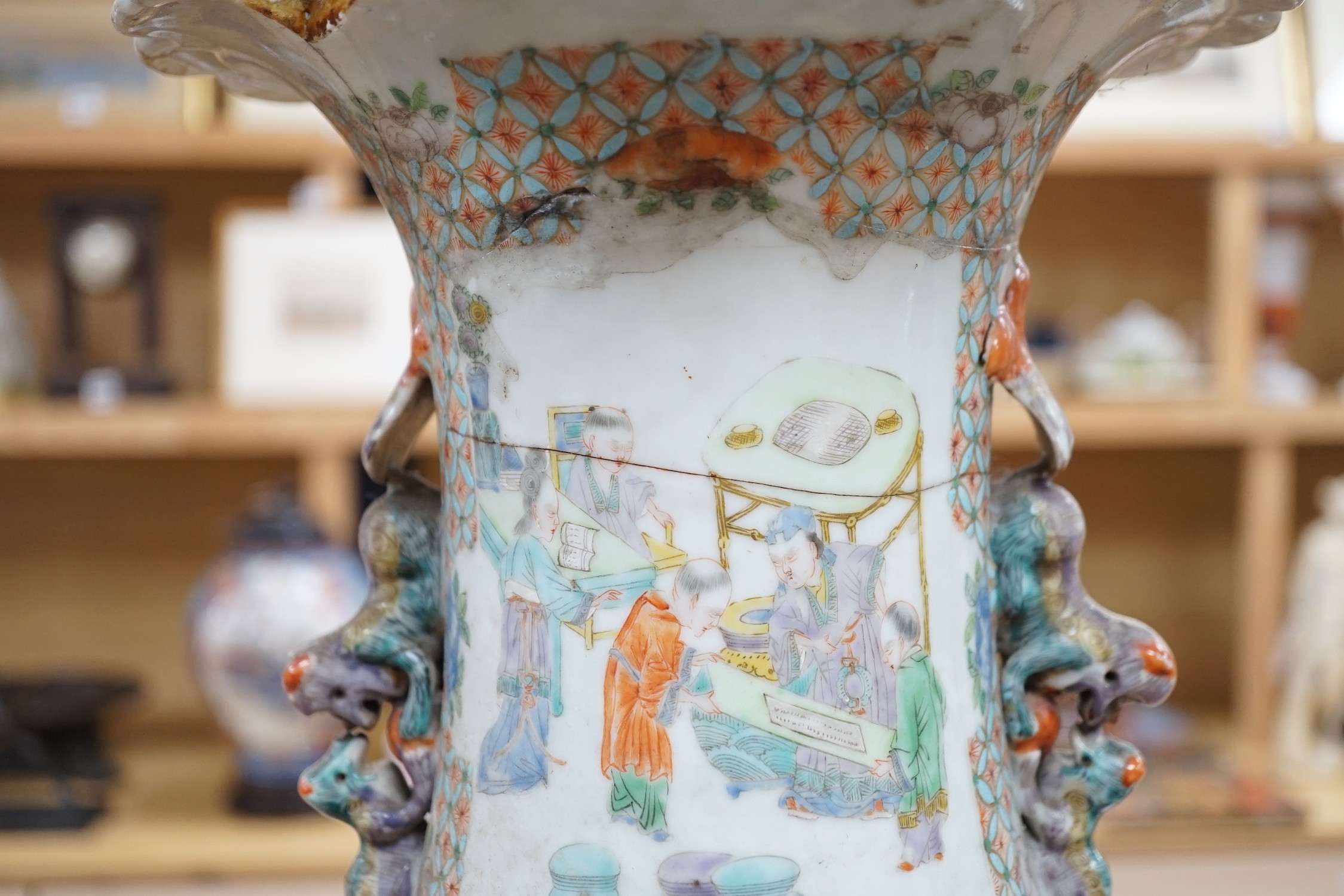 A large pair of Chinese export famille verte dragon vases (in need of restoration), 63cms high